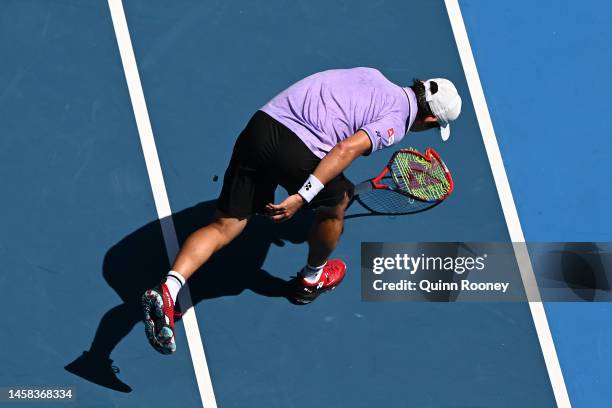 Yoshihito Nishioka of Japan shows frustration during the fourth round singles match against Karen Khachanov during day seven of the 2023 Australian...
