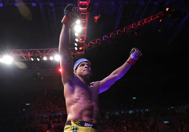 Gilbert Burns of Brazil reacts after his submission victory over Neil Magny in a welterweight fight during the UFC 283 event at Jeunesse Arena on...