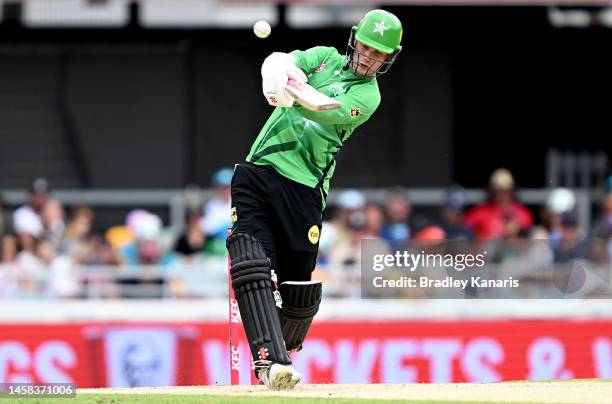 Tom Rogers of the Stars hits the ball to the boundary for a four during the Men's Big Bash League match between the Brisbane Heat and the Melbourne...