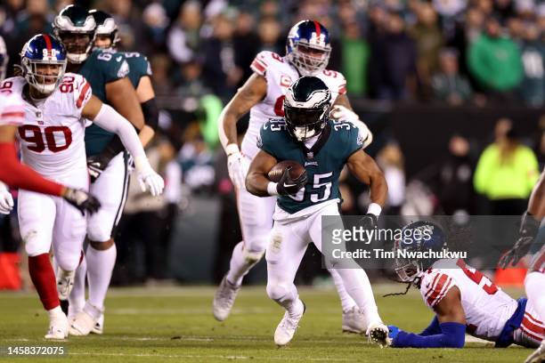 Boston Scott of the Philadelphia Eagles carries the ball against the New York Giants during the second quarter in the NFC Divisional Playoff game at...