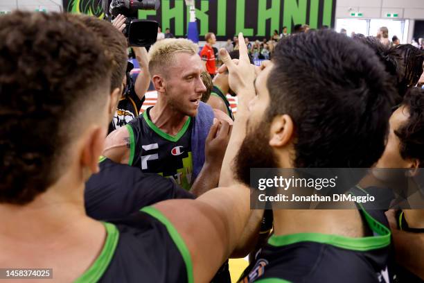 Phoenix players are seen in a huddle after their win during the round 16 NBL match between South East Melbourne Phoenix and Perth Wildcatse at State...