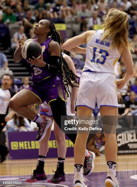 Tiffany Mitchell of the Boomers drives to the basket during the round 11 WNBL match between Melbourne Boomers and Bendigo Spirit at Melbourne Sports...