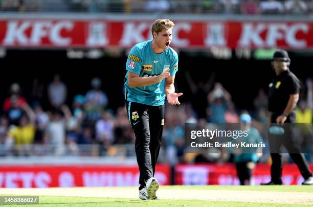 Spencer Johnson of the Heat celebrates victory after the Men's Big Bash League match between the Brisbane Heat and the Melbourne Stars at The Gabba,...