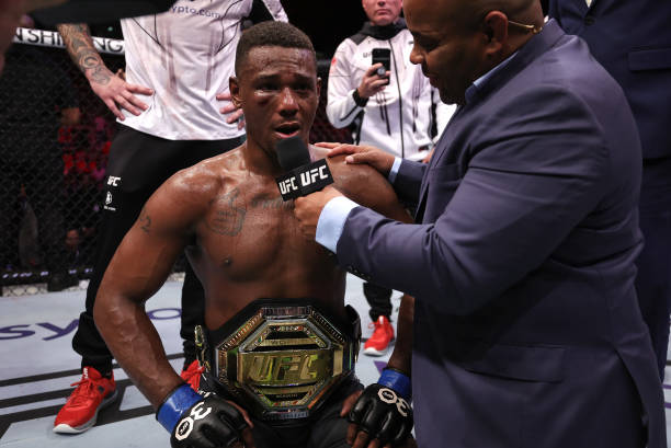 Jamahal Hill reacts after his victory over Glover Teixeira of Brazil in the UFC light heavyweight championship fight during the UFC 283 event at...