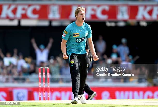 Spencer Johnson of the Heat celebrates victory after the Men's Big Bash League match between the Brisbane Heat and the Melbourne Stars at The Gabba,...