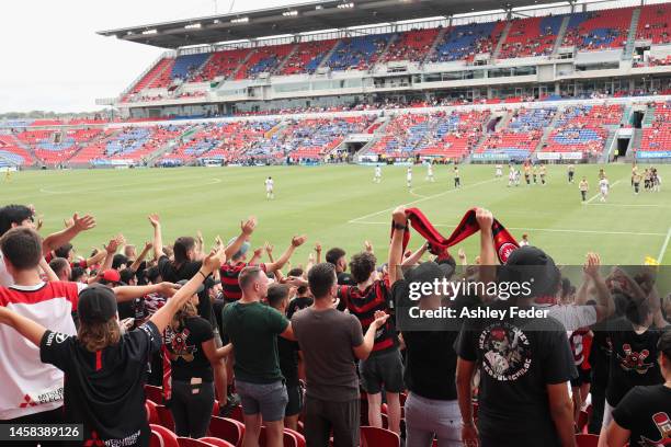 Western Sydney fans celebrate during the round 13 A-League Men's match between Newcastle Jets and Western Sydney Wanderers at McDonald Jones Stadium,...