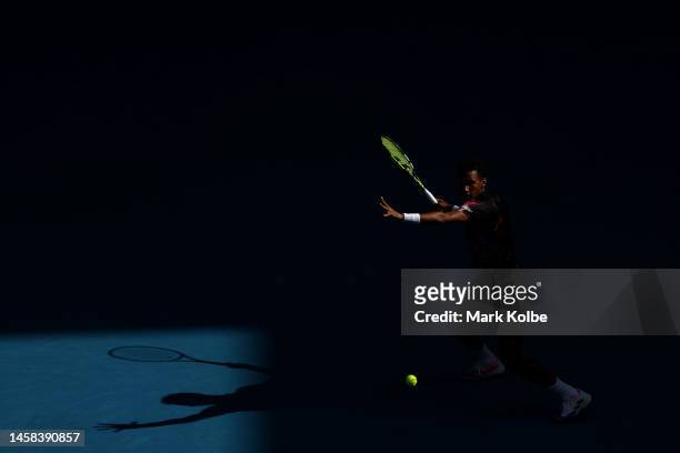 Felix Auger-Aliassime of Canada plays a forehand during the fourth round singles match against Jiri Lehecka of the Czech Republic during day seven of...