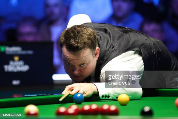 Shaun Murphy of England plays a shot during the semi-final match against Judd Trump of England on day six of the 2023 Duelbits World Grand Prix at...