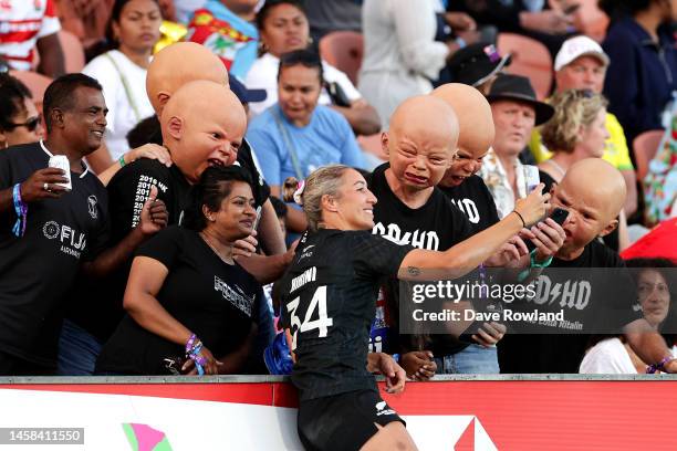 Sarah Hirini of New Zealand takes a selfie with fans during the 2023 HSBC Sevens match between the United States and New Zealand at FMG Stadium on...