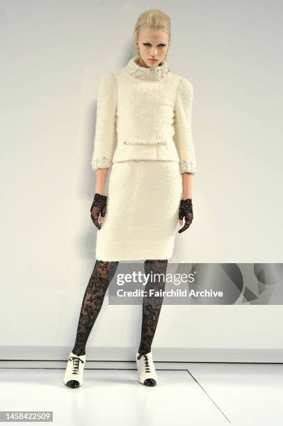 Model Yulia Lobova on the runway at Chanel's fall 2009 haute couture show at the Grand Palais in Paris.