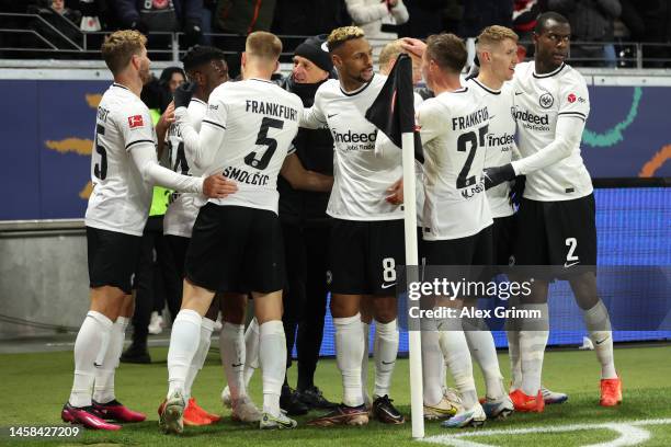 Rafael Borre of Eintracht Frankfurt celebrates their team's second goal with teammates during the Bundesliga match between Eintracht Frankfurt and FC...