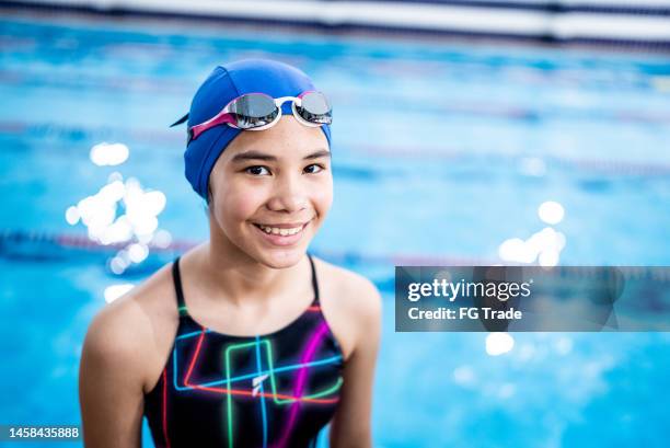 portrait of a girl in the poolside - swimmer stock pictures, royalty-free photos & images