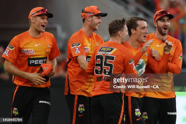 Nick Hobson of the Scorchers celebrates after taking a catch to dismiss Matthew Critchley of the Renegades during the Men's Big Bash League match...