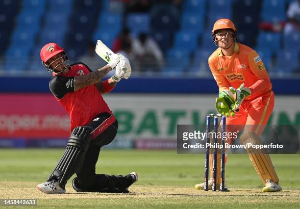 Alex Hales of Desert Vipers hits a six watched by Tom Banton during the DP World ILT20 match between Desert Vipers and Gulf Giants at Dubai...