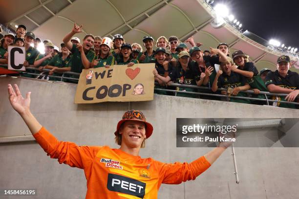 Cooper Connolly of the Scorchers poses with supporters after winning the Men's Big Bash League match between the Perth Scorchers and the Melbourne...