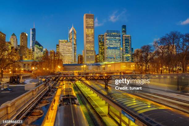 metra train station and chicago cityscape - bright chicago city lights stock pictures, royalty-free photos & images