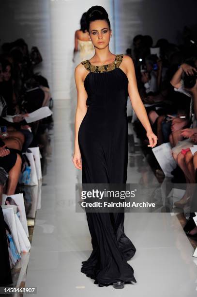 Model on the runway at Evening Sherri Hill's spring 2013 show at Trump Tower.
