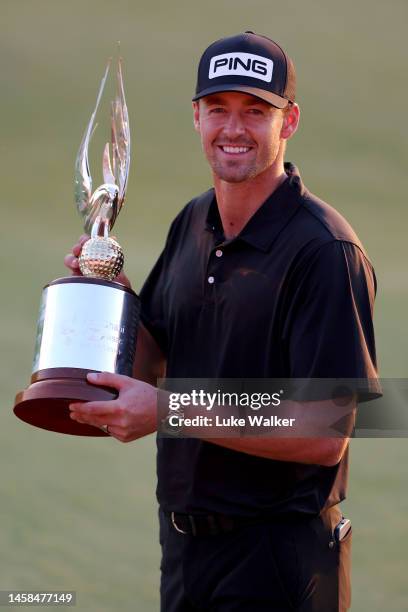 Victor Perez of France poses with the trophy during day four of the Abu Dhabi HSBC Championship at Yas Links Golf Course on January 22, 2023 in Abu...