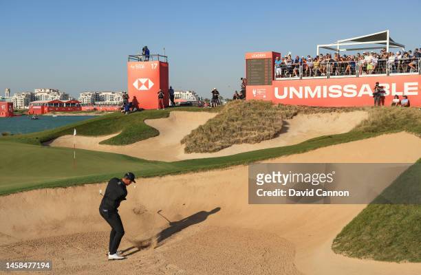 Victor Perez of France plays his second shot on the 17th hole which he holed from the green-side bunker for a birdie 2 during the final round on day...