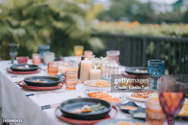 asian fusion food outdoor dining dinner table place setting - dukning bildbanksfoton och bilder