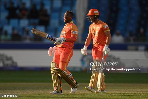 Shimron Hetmyer and Chris Lynn of Gulf Giants smile during the DP World ILT20 match between Desert Vipers and Gulf Giants at Dubai International...