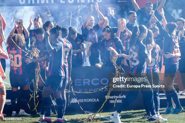 Players of FC Barcelona celebrate the victory with the winners trophy during the Spanish Women Supercup, Final, football match played between Real...