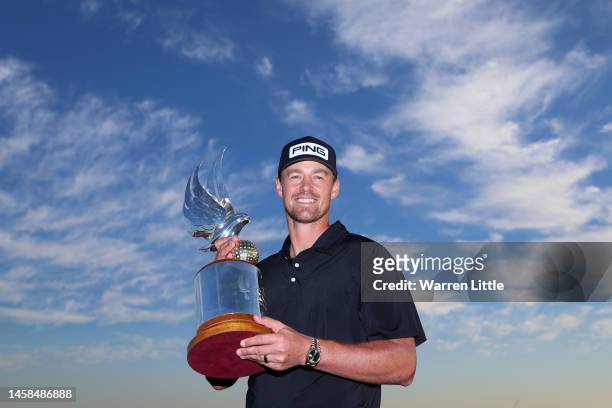 Victor Perez of France poses with the trophy during day four of the Abu Dhabi HSBC Championship at Yas Links Golf Course on January 22, 2023 in Abu...