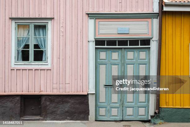 close-up of colourful facades of houses in kalmar, sweden - kalmar stock pictures, royalty-free photos & images