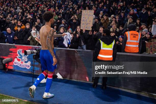 Chris Richards of Crystal Palace diving his shirt to young fan during the Premier League match between Crystal Palace and Newcastle United at...