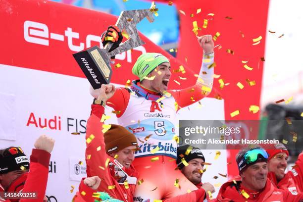 Daniel Yule of Switzerland celebrates victory at the winners ceremony for the Men's Slalom of the Audi FIS Alpine Ski World Cup at Gansler Alm on...