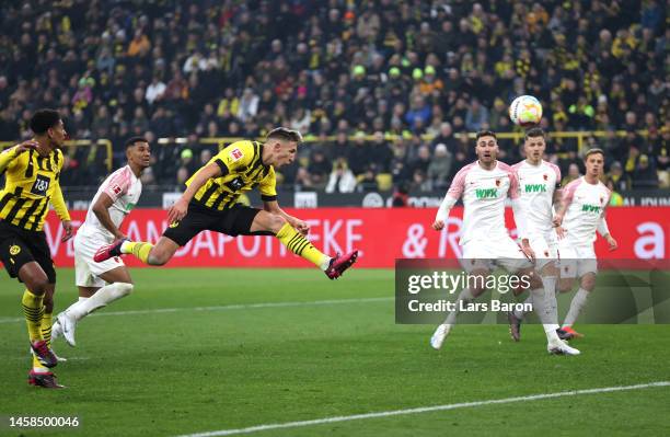 Nico Schlotterbeck of Borussia Dortmund scores the team's second goal during the Bundesliga match between Borussia Dortmund and FC Augsburg at Signal...