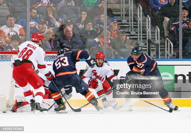 Anders Lee of the New York Islanders takes the shot against Jalen Chatfield of the Carolina Hurricanes at UBS Arena on January 21, 2023 in Elmont,...