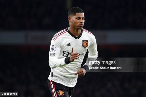 Marcus Rashford of Manchester United celebrates after scoring the team's first goal during the Premier League match between Arsenal FC and Manchester...