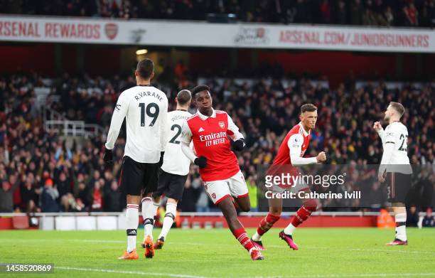Eddie Nketiah of Arsenal celebrates after scoring the team's first goal during the Premier League match between Arsenal FC and Manchester United at...