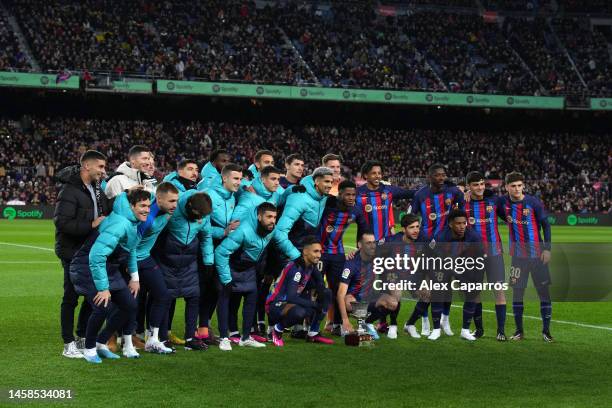 Players of FC Barcelona present the Spanish Supercopa Trophy to the fans prior to the LaLiga Santander match between FC Barcelona and Getafe CF at...