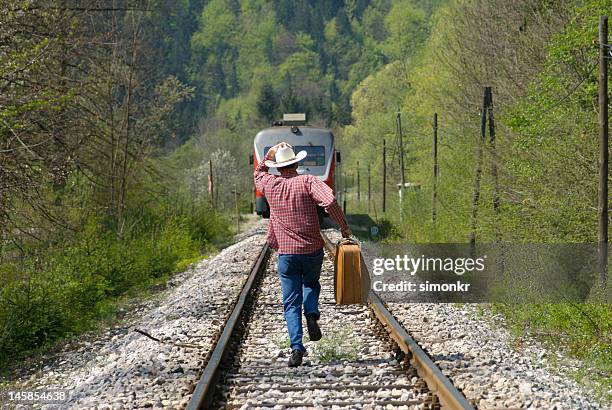 running for the train - catching train stock pictures, royalty-free photos & images