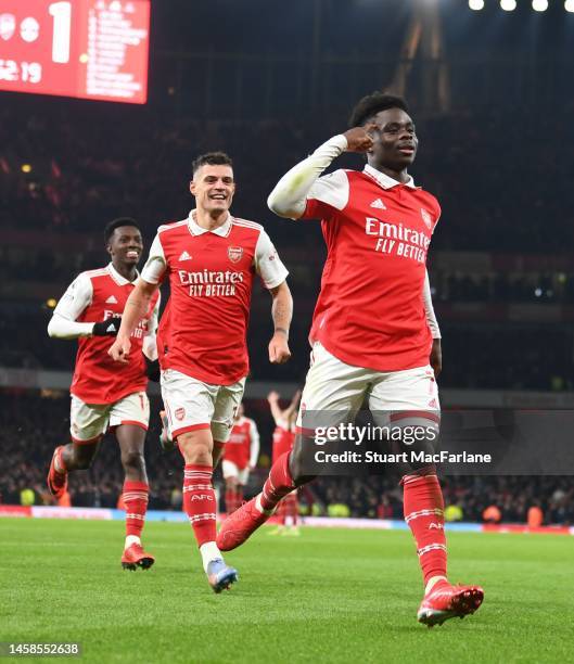 Bukayo Saka celebrates scoring the 2nd Arsenal goal during the Premier League match between Arsenal FC and Manchester United at Emirates Stadium on...