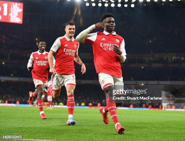 Bukayo Saka celebrates scoring the 2nd Arsenal goal during the Premier League match between Arsenal FC and Manchester United at Emirates Stadium on...