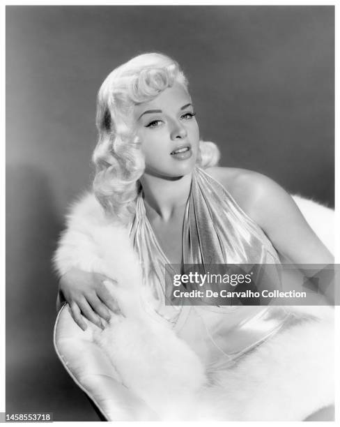 Publicity portrait of British actor Diana Dors in the film 'The Unholy Wife' United States.