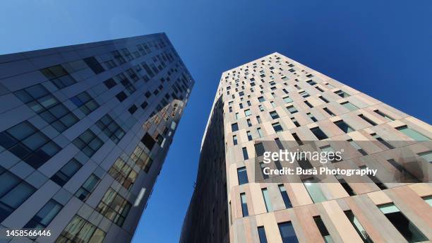 office building towers in the poble nou district of barcelona, spain - nou stock pictures, royalty-free photos & images