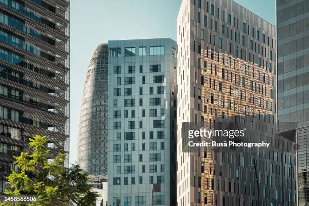 office building towers in the poble nou district of barcelona, spain - nou stock pictures, royalty-free photos & images