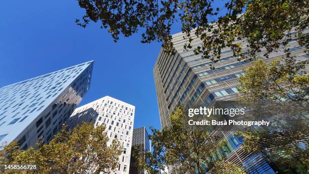 office building towers in the poble nou district of barcelona, spain - nou stock pictures, royalty-free photos & images