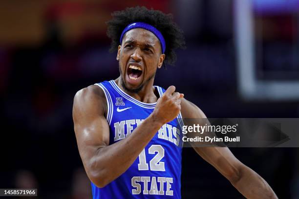 DeAndre Williams of the Memphis Tigers celebrates after beating the Cincinnati Bearcats 75-68 at Fifth Third Arena on January 22, 2023 in Cincinnati,...