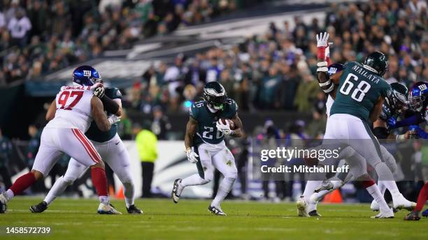 Miles Sanders of the Philadelphia Eagles runs the ball against the New York Giants during the NFC Divisional Playoff game at Lincoln Financial Field...