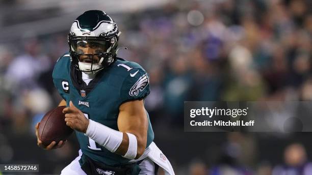 Jalen Hurts of the Philadelphia Eagles runs the ball against the New York Giants during the NFC Divisional Playoff game at Lincoln Financial Field on...