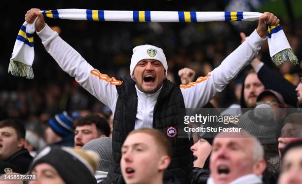 Leeds United fan in hat and scarf supports his team during the Premier League match between Leeds United and Brentford FC at Elland Road on January...