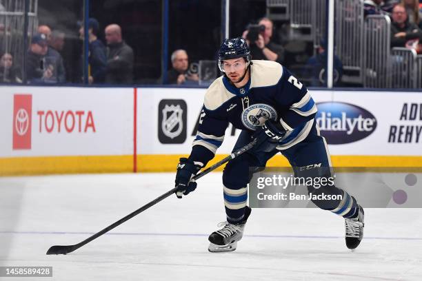 Andrew Peeke of the Columbus Blue Jackets skates with the puck during the first period of a game against the Anaheim Ducks at Nationwide Arena on...