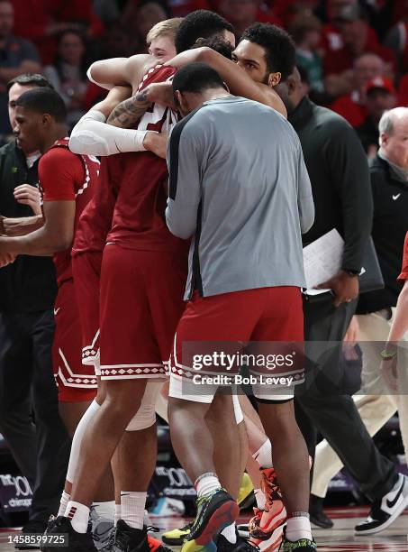 The Temple Owls celebrate after defeating the number one ranked Houston Cougars at Fertitta Center on January 22, 2023 in Houston, Texas.