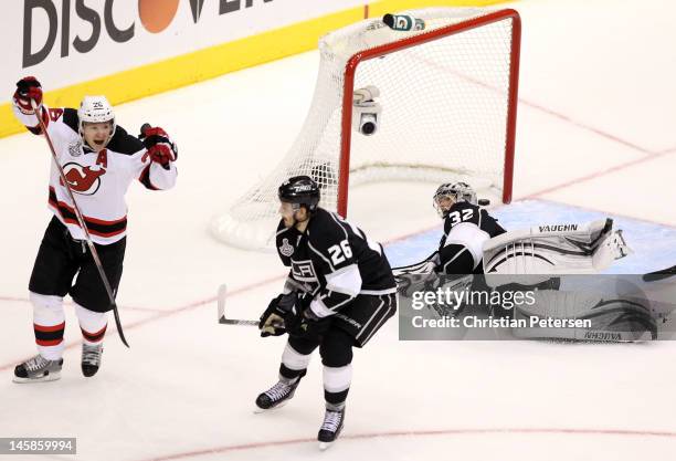 Patrik Elias of the New Jersey Devils celebrates his third period goal over Slava Voynov and goaltender Dustin Brown of the Los Angeles Kings in Game...