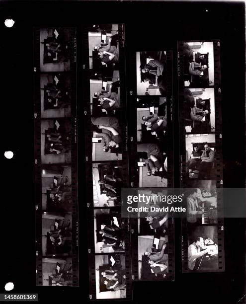 Photographer's original vintage contact sheet of a photo shoot with songwriters and producers Jerry Leiber and Mike Stoller in Stoller's apartment in...